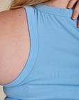 Back view close up of  Racerback Tank in Baby Blue on Juliet