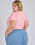 Jr. Varsity Tee in Baby Pink angled back view on Juliet