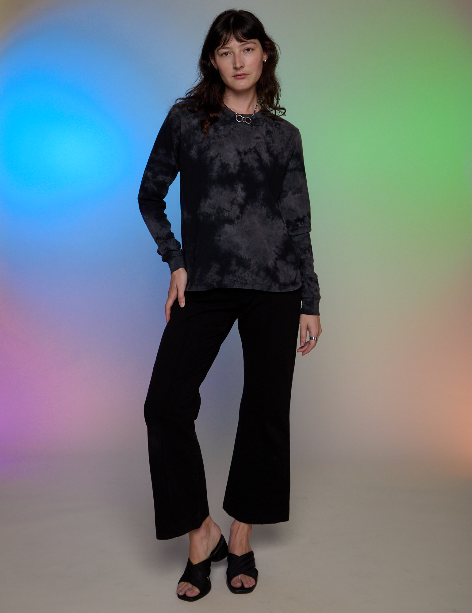 Alex is wearing Magic Waters Long Sleeve Burly Tee in Black