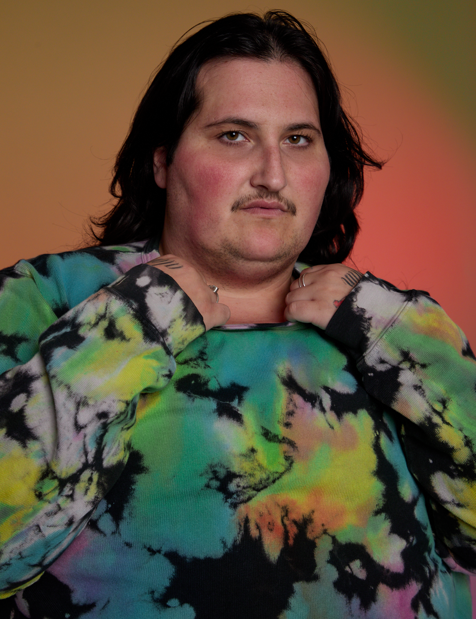 Magic Waters Long Sleeve Burly Tee in Rainbow front close up on Sam