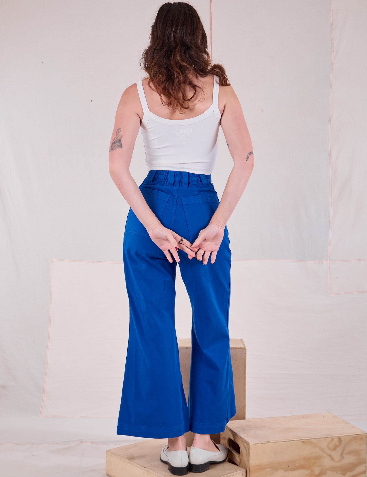 Back view of Bell Bottoms in Royal Blue and Cami in Vintage Tee Off-White