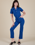 Alex is wearing Short Sleeve Jumpsuit in Royal Blue