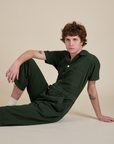 Quinn is wearing Short Sleeve Jumpsuit in Swamp Green
