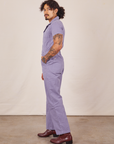 Side view of Short Sleeve Jumpsuit in Faded Grape worn by Jesse