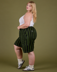 Longline Work Shorts in Evergreen side view on Juliet