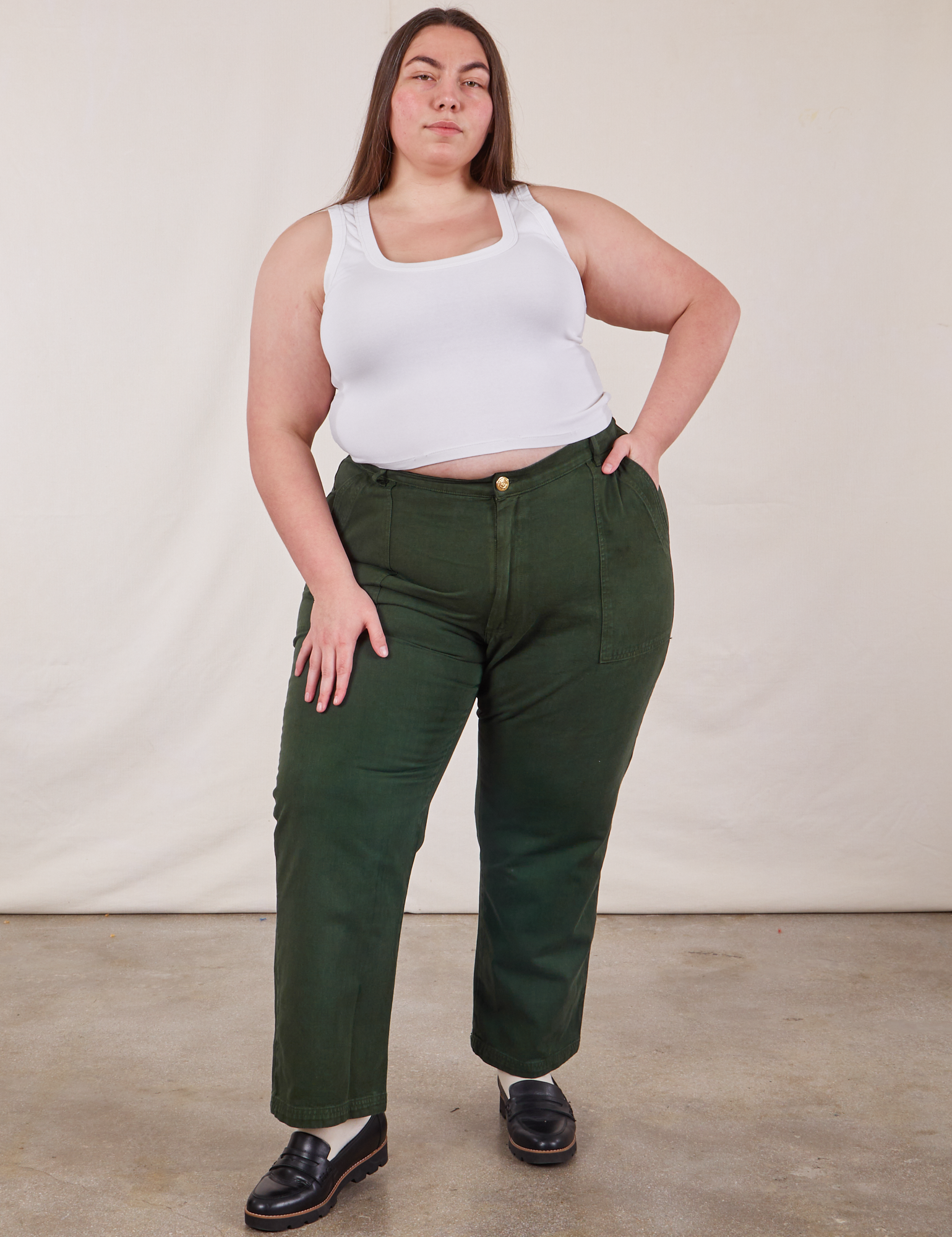 Marielena is wearing Work Pants in Swamp Green and vintage tee off-white Cropped Tank