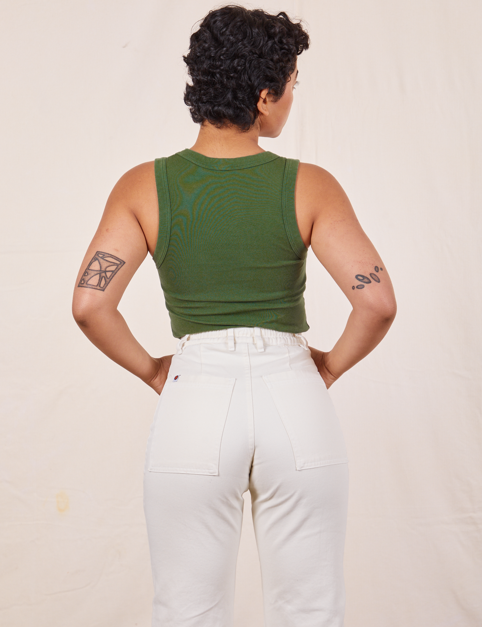 Back view of Tank Top in Dark Emerald Green on Mika