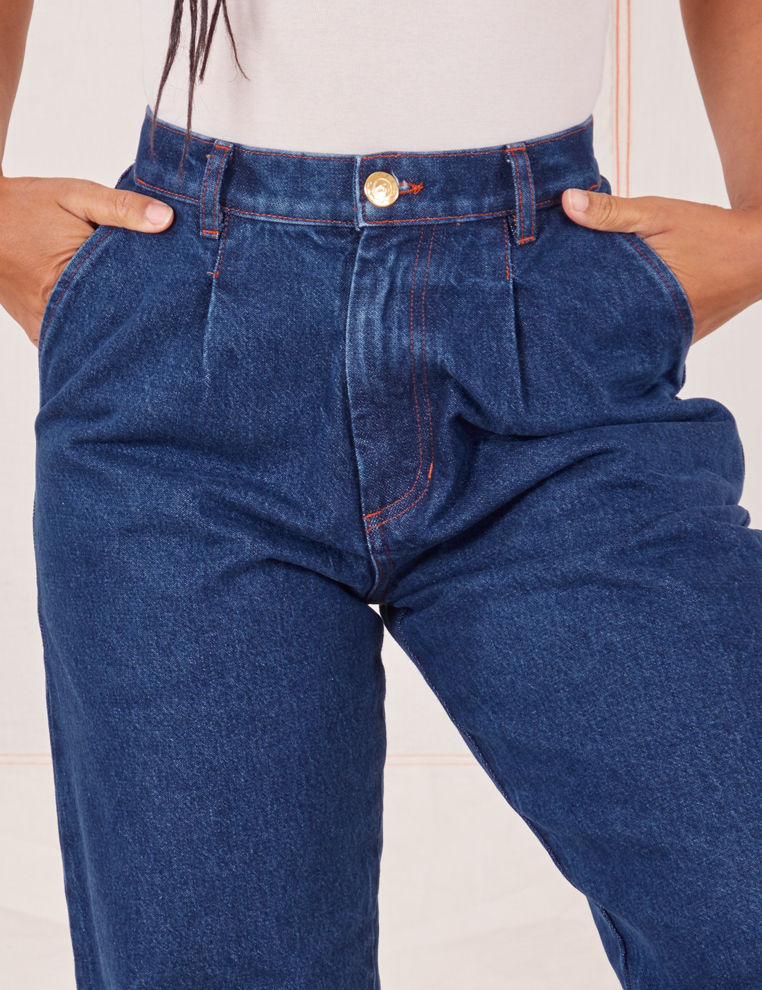 Front close up of Denim Trouser Jeans in Dark Wash. Gabi has both hands in the pocket.
