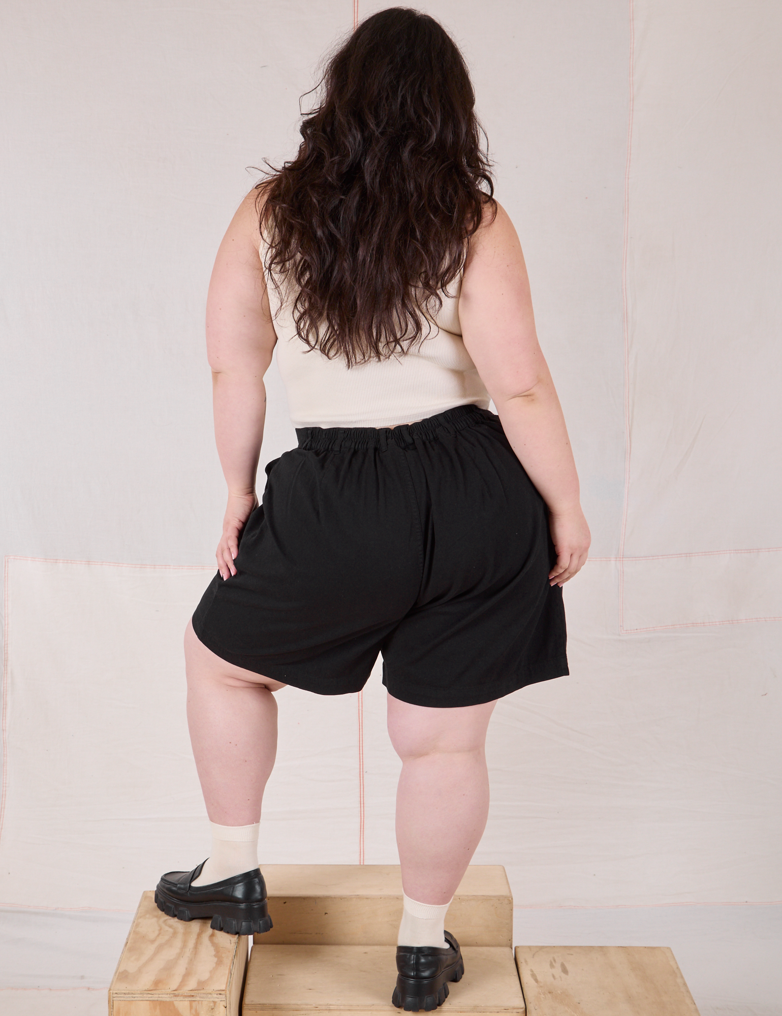 Trouser Shorts in Basic Black back view on Ashley
