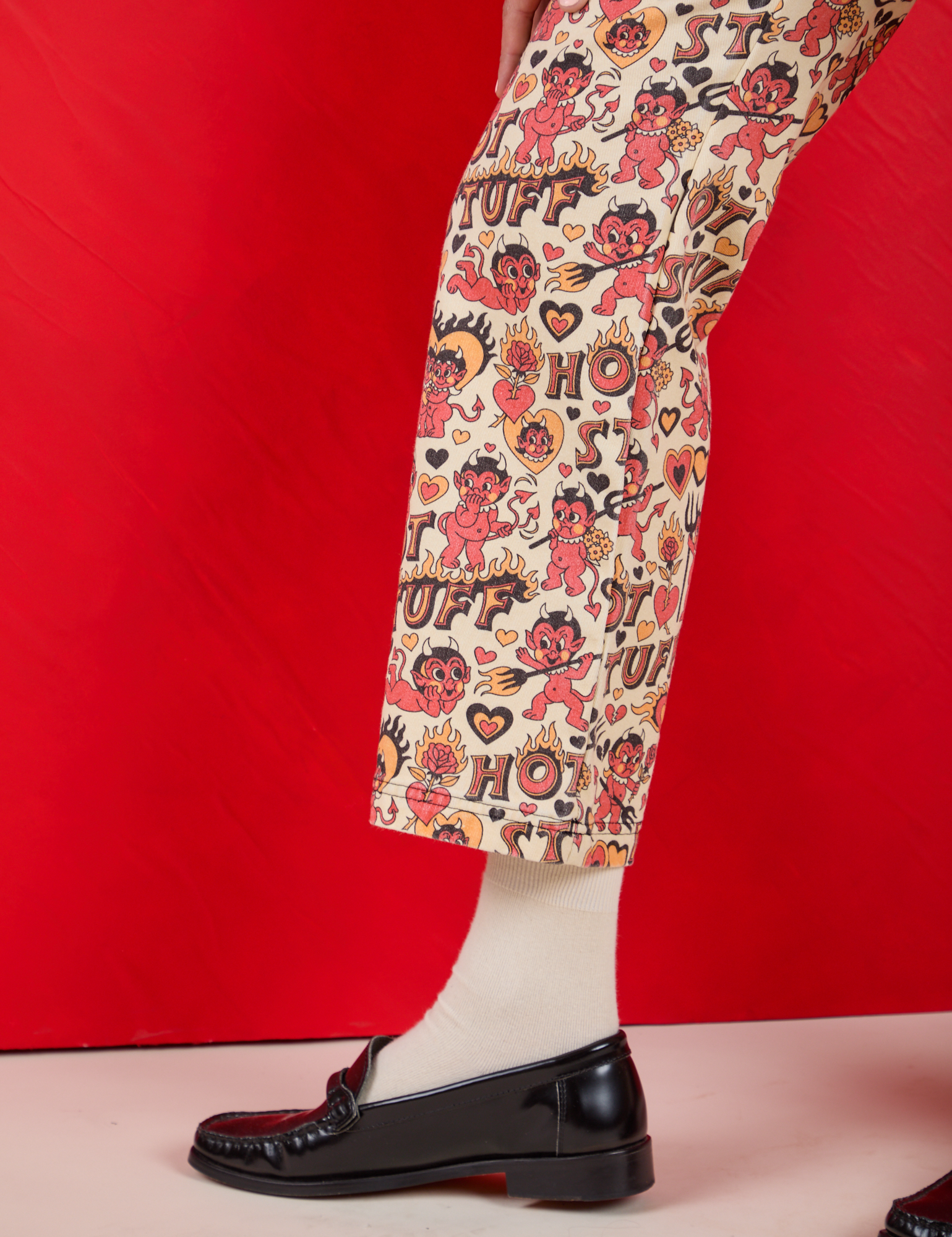 Work Pants in Hot Stuff Print pant leg close up on Shahana