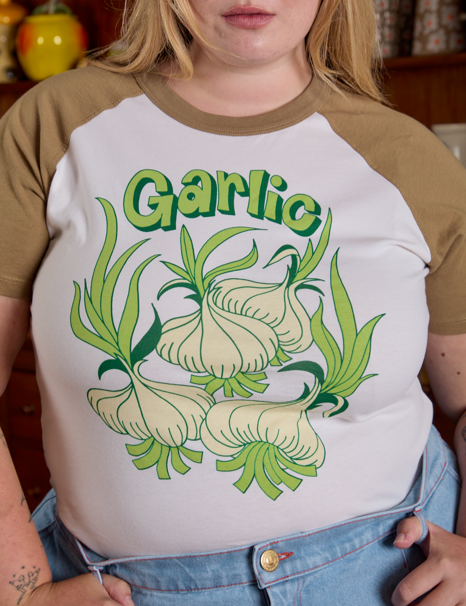 Short Sleeve Raglan Tee in Garlic front close up on Juliet