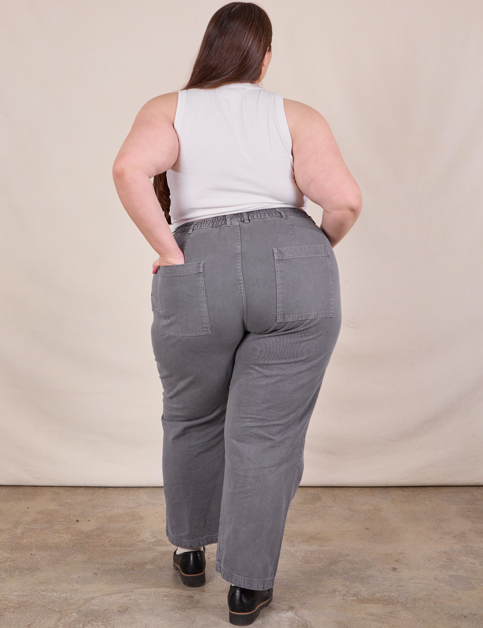 Back view of Work Pants in Washed Grey and Cropped Tank in Vintage Tee Off-White on Marielena