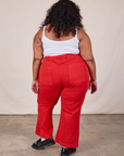 Back view of Western Pants in Mustang Red and Cropped Cami in Vintage Tee Off-White