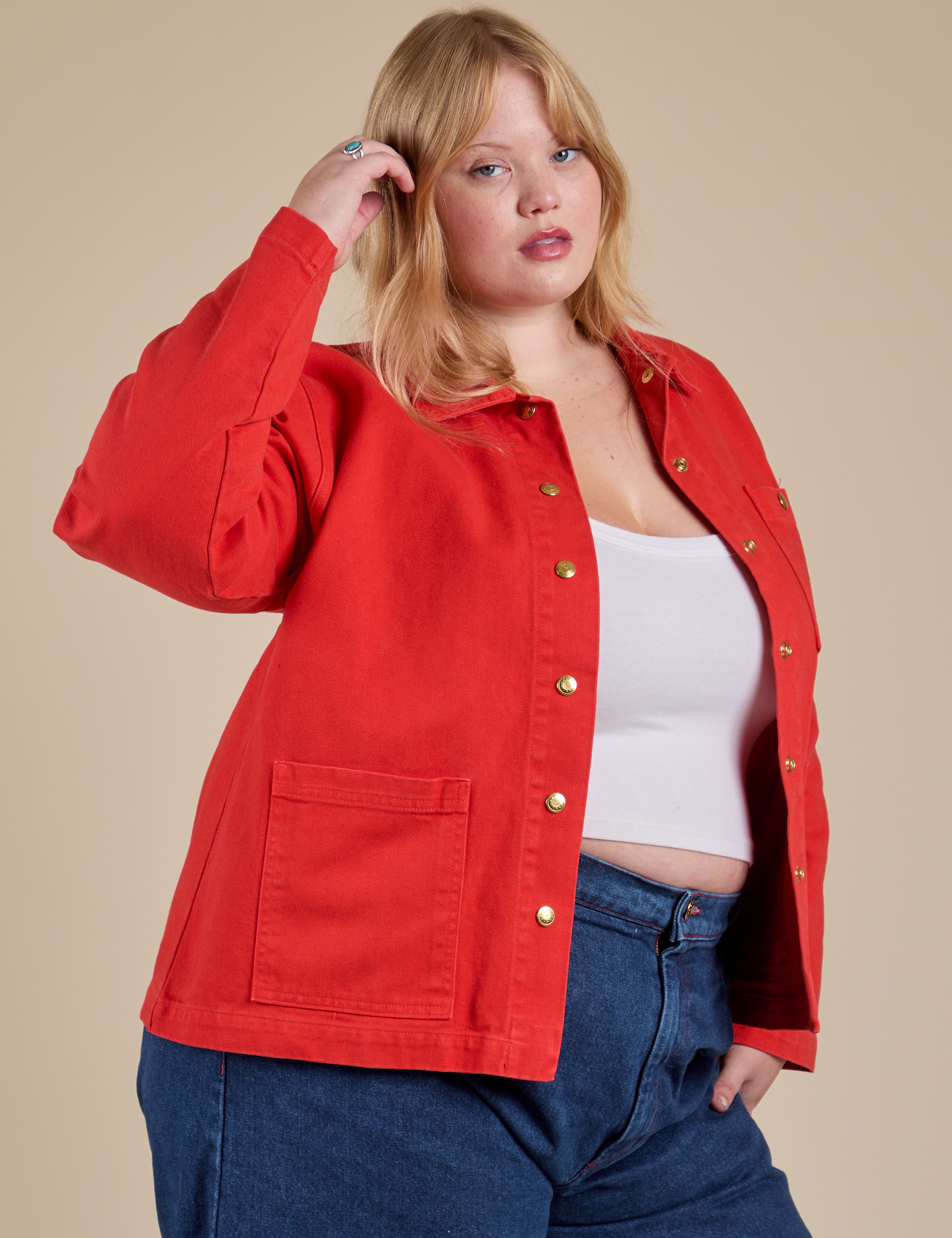 Angled front view of Denim Work Jacket in Mustang Red on Juliet