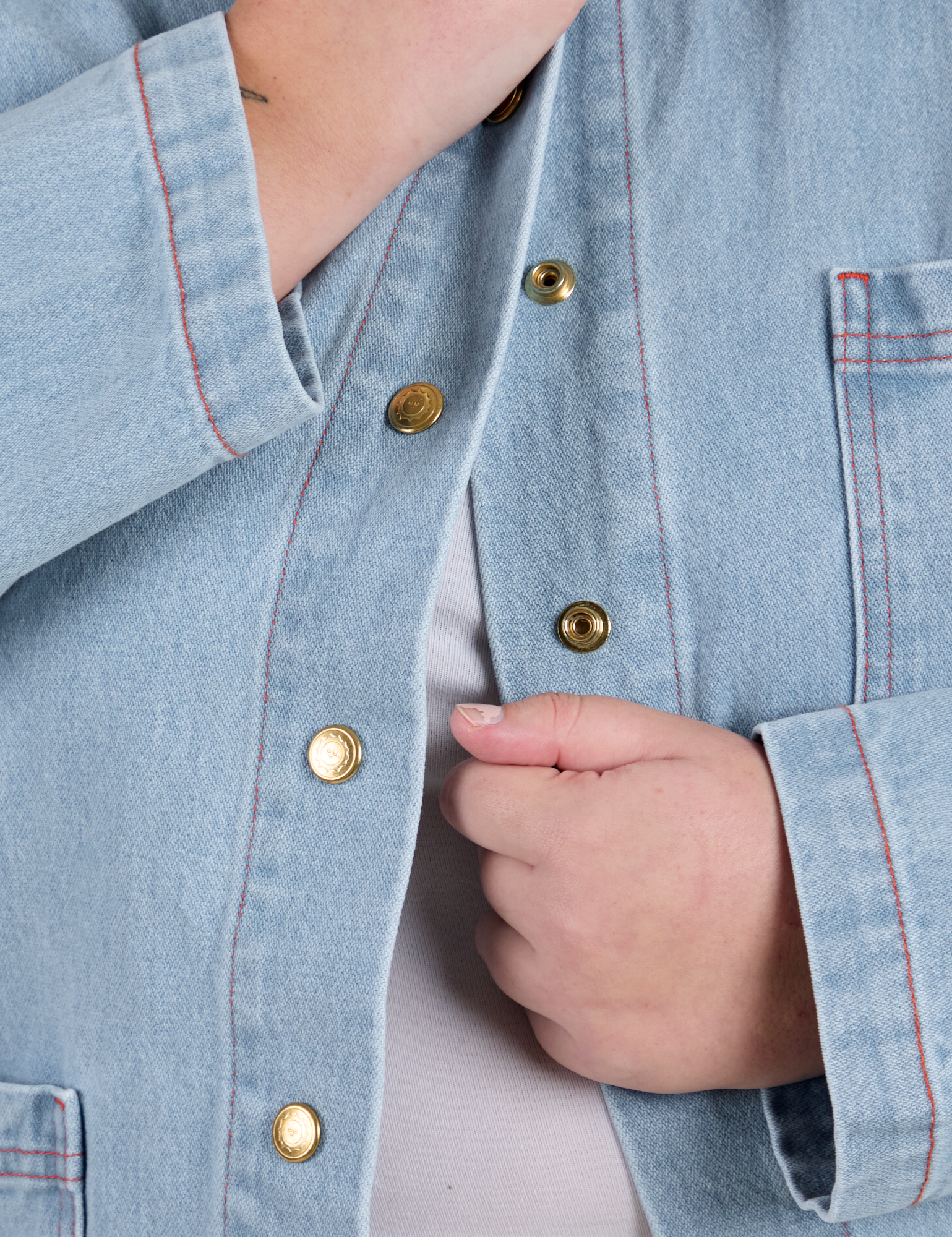 Indigo Denim Work Jacket in Light Wash close up on Juliet