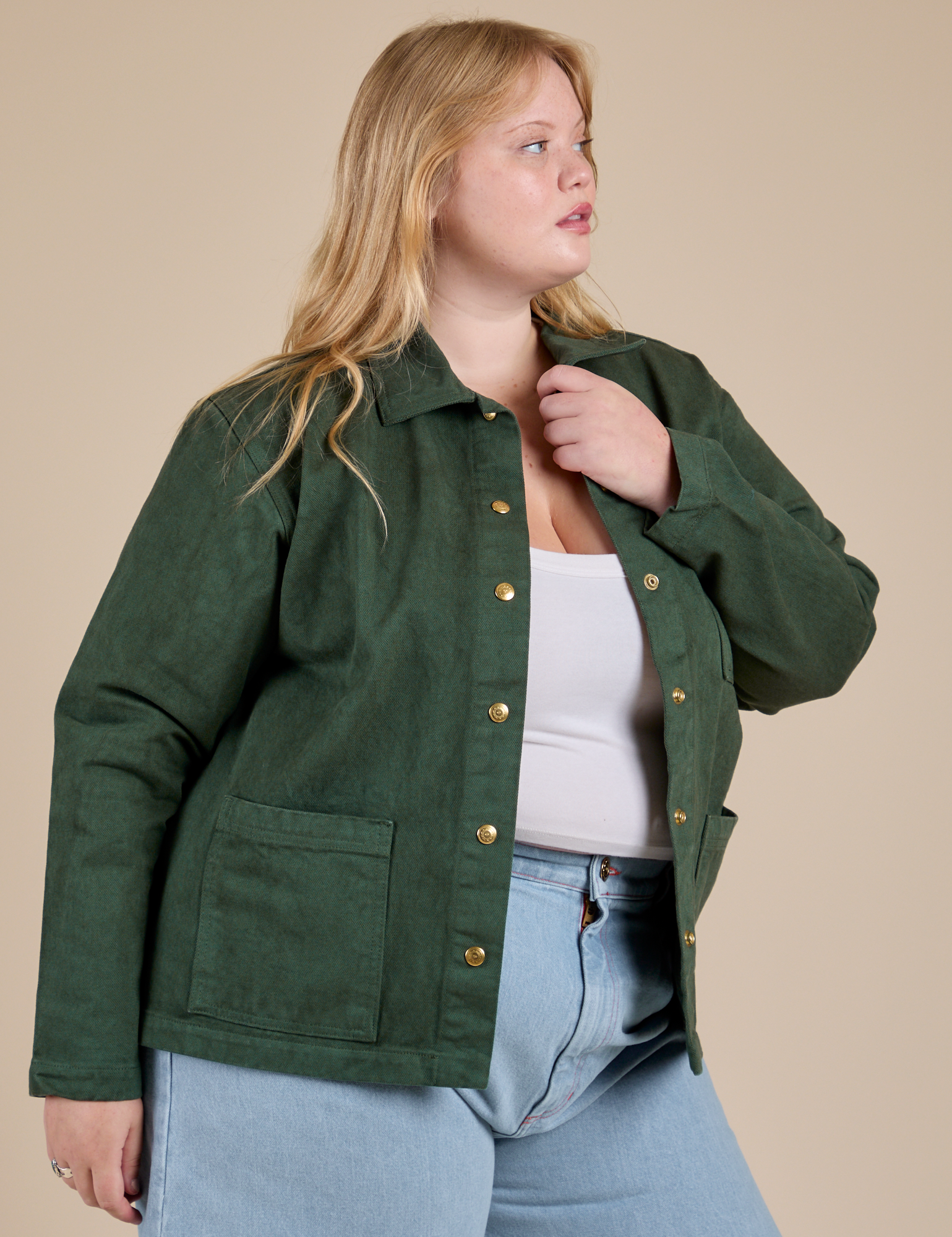 Angled front view of Denim Work Jacket in Swamp Green on Juliet