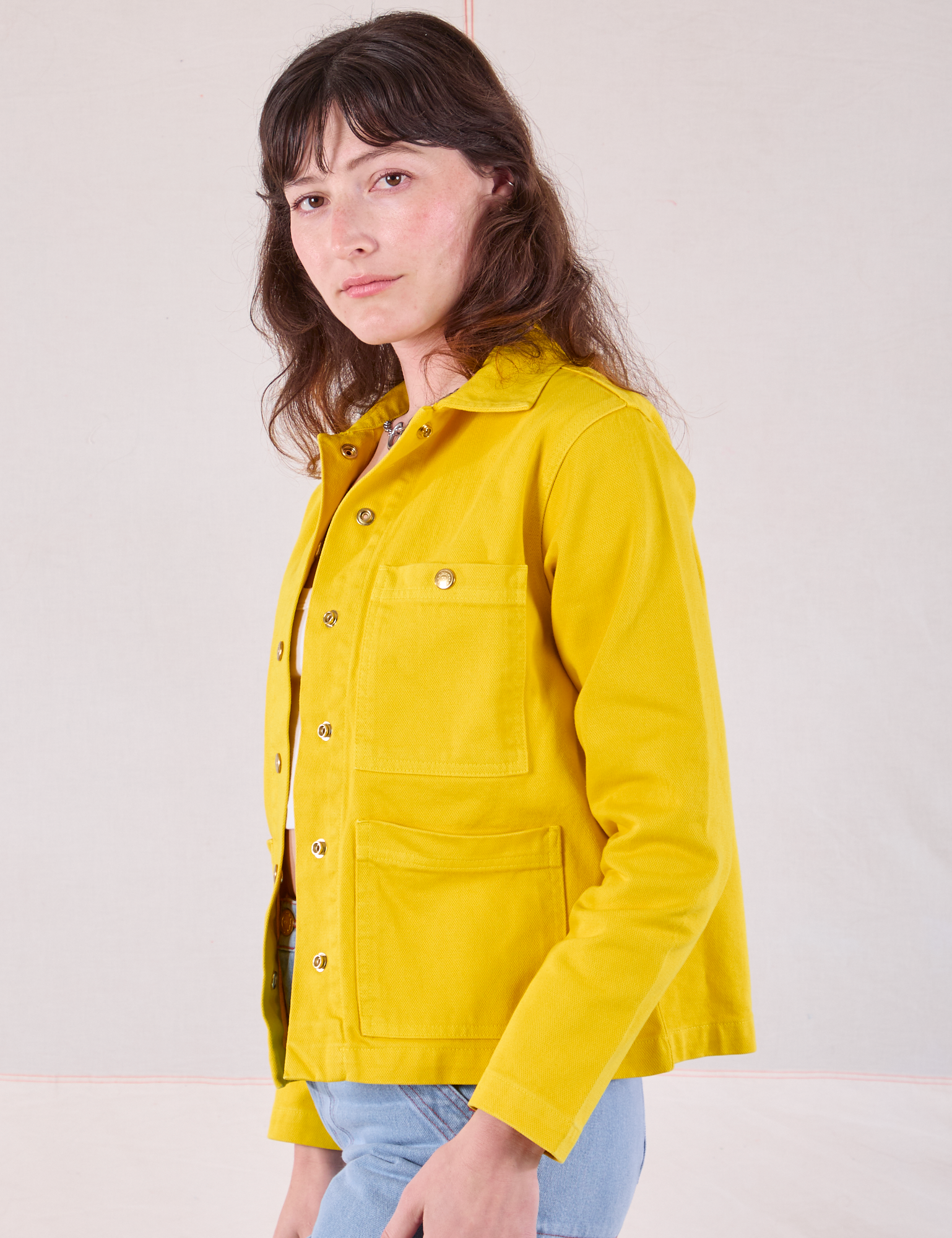 Denim Work Jacket in Golden Yellow side view on Alex