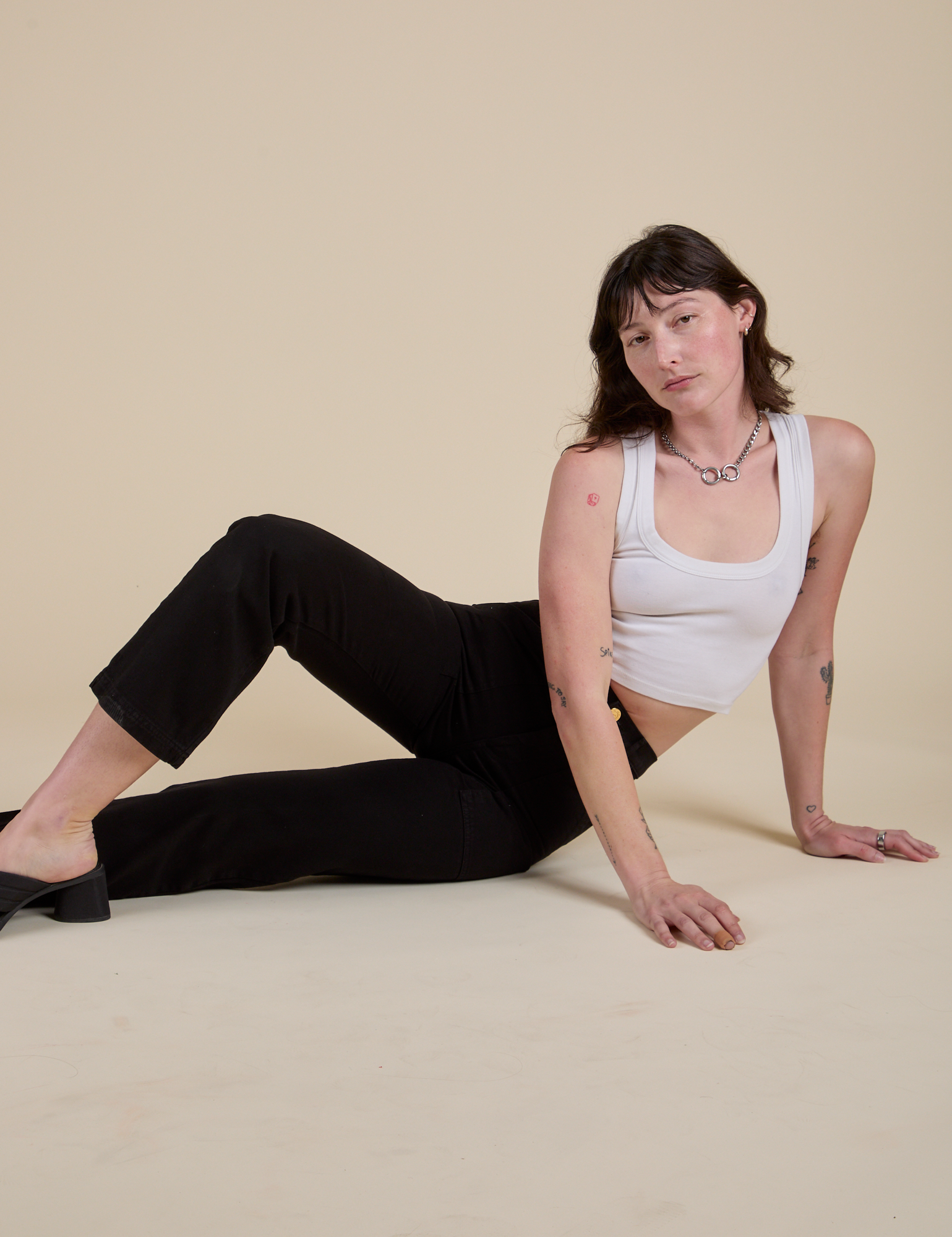 Work Pants in Basic Black and vintage tee white Cropped Tank worn by Alex