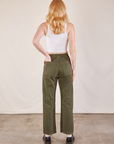 Back view of Work Pants in Surplus Green and Cropped Tank in vintage tee off-white on Margaret