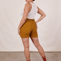 Back view of Classic Work Shorts in Spicy Mustard and vintage off-white Tank Top worn by Tiara