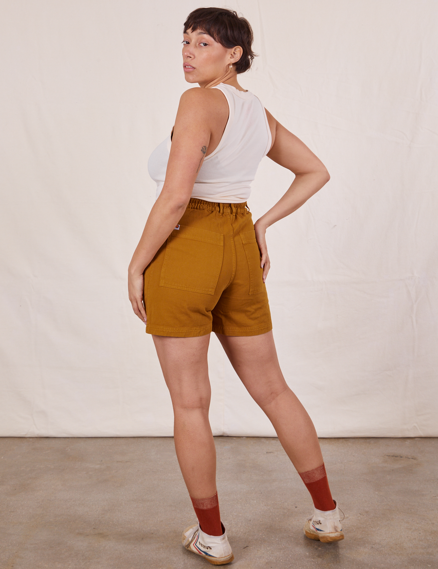 Back view of Classic Work Shorts in Spicy Mustard and vintage off-white Tank Top worn by Tiara
