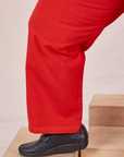 Mid-Rise Work Pants in Mustang Red pant leg close up on Sam