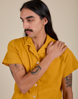 Pantry Button-Up in Mustard Yellow close up on Anthony