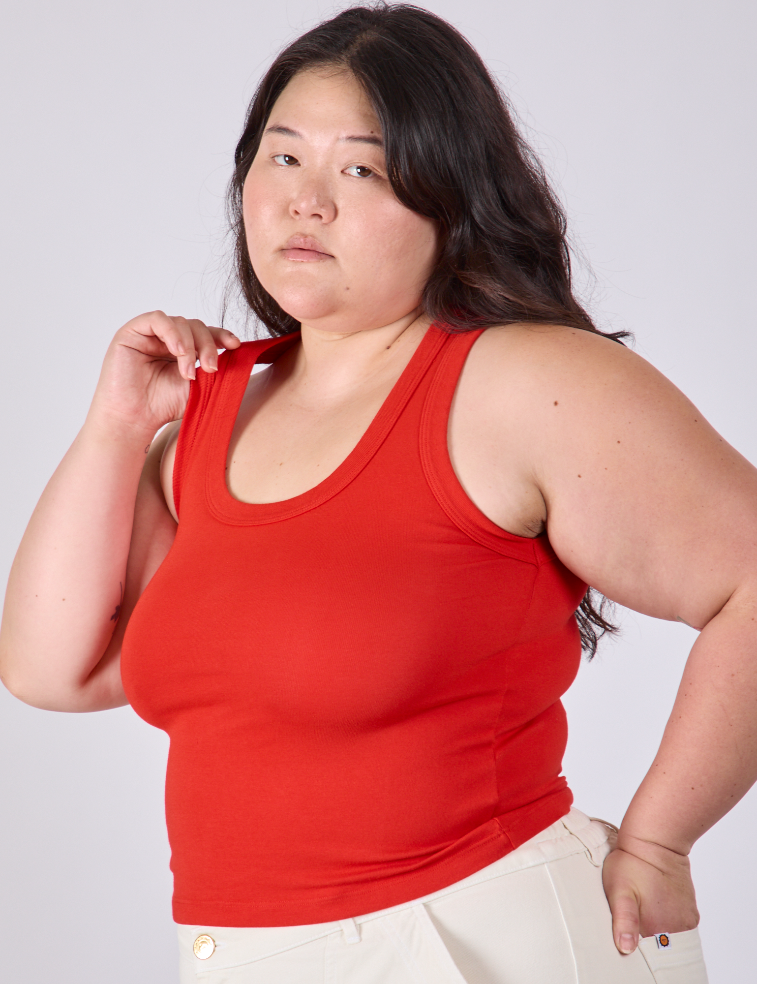 Angled front view of Tank Top in Mustang Red on Ashley