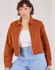 Tiara is 5’4” and wearing XS Ricky Jacket in Burnt Terracotta