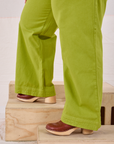 Action Pants in Gross Green pant leg close up on Ashley