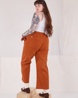 Action Pants in Burnt Terracotta angled back view on Sydney