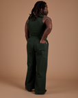 Back view of Action Pants in Swamp Green and swamp green Tank Top on Demi