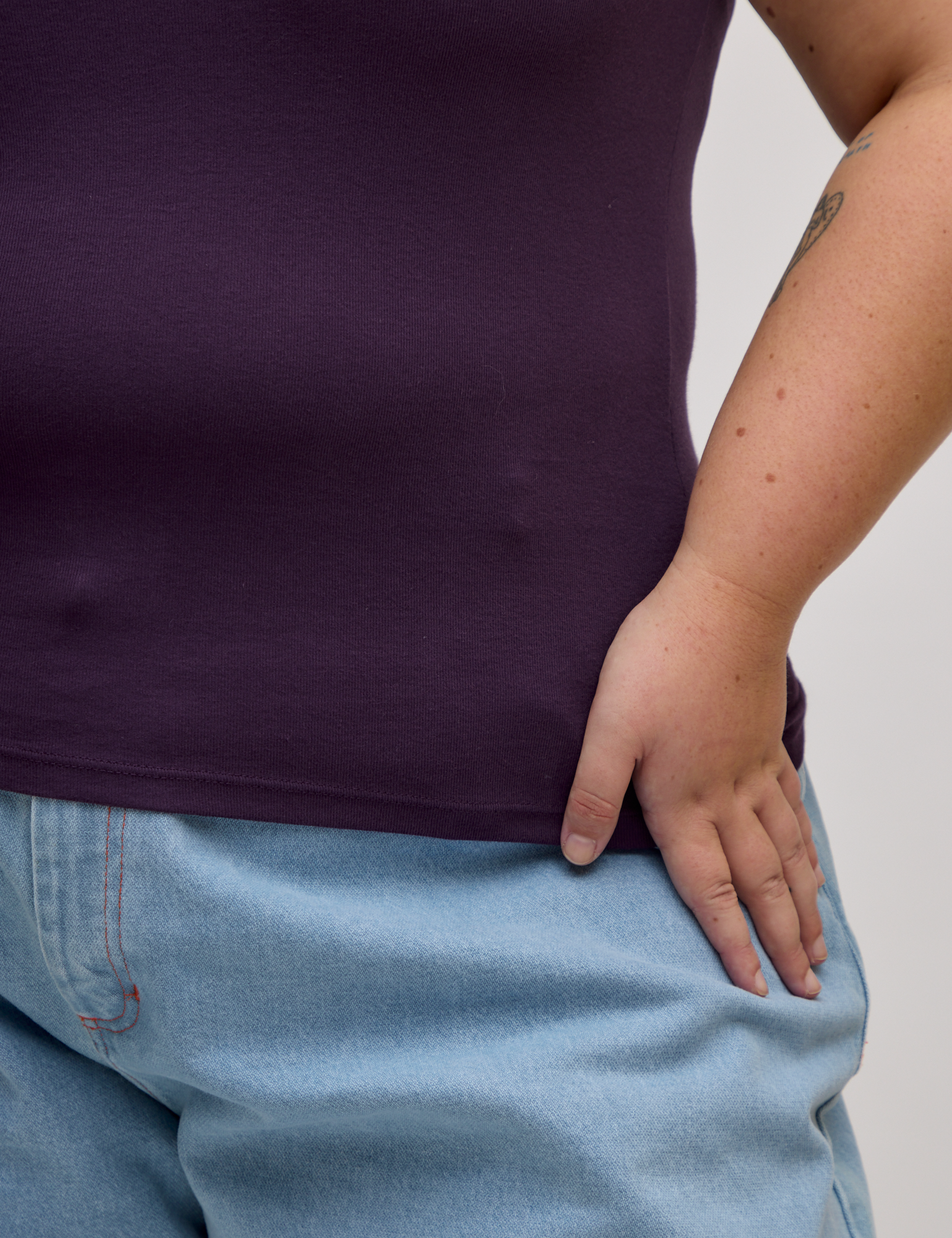 Close up of Baby Tee in Nebula Purple on Juliet