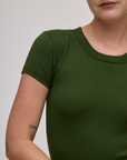 Front close up of Baby Tee in Evergreen on Alex