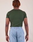 Baby Tee in Swamp Green back view on Isaac