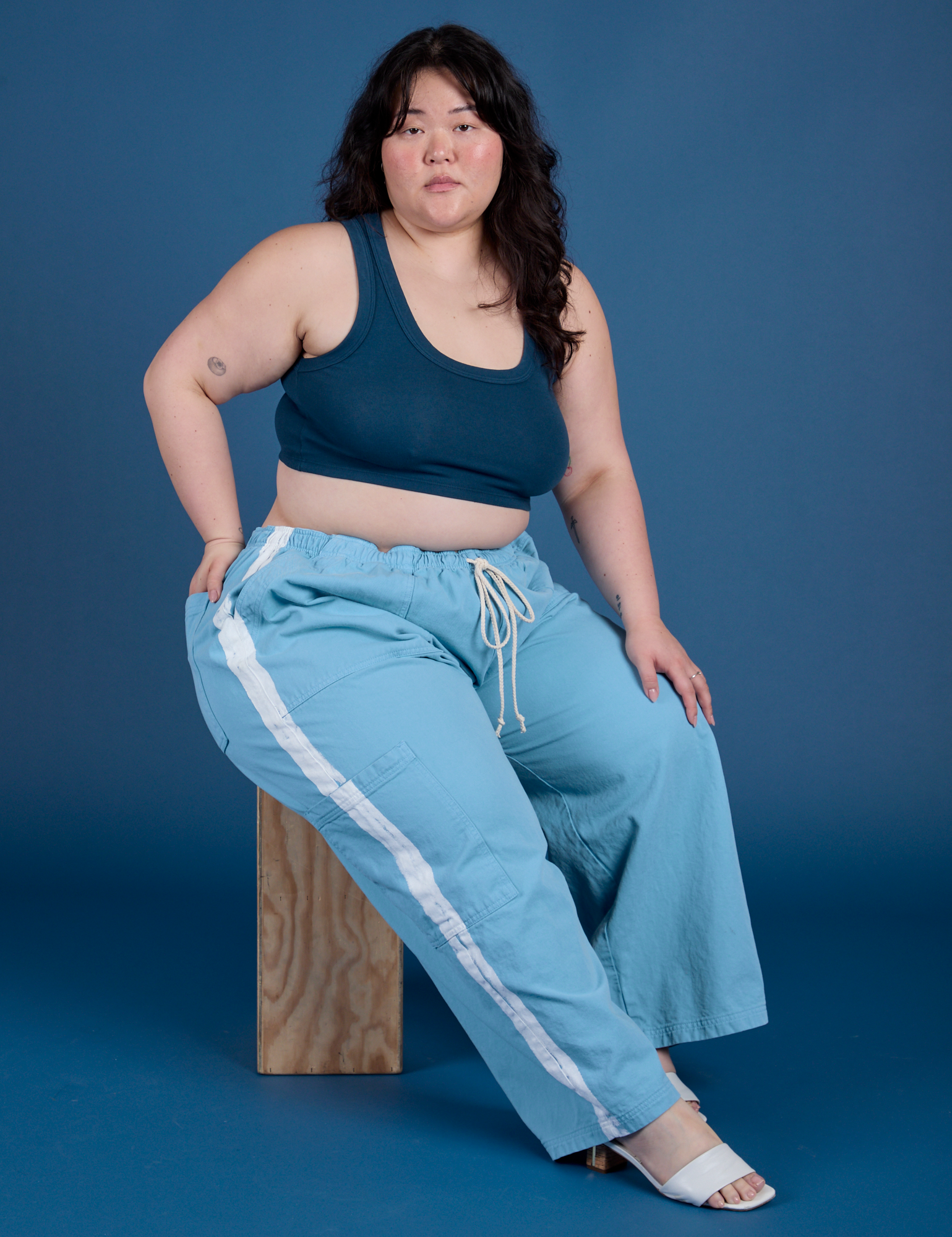 Painted Drop Pocket Cargo Pants in Baby Blue and lagoon Mini Tank on Ashley