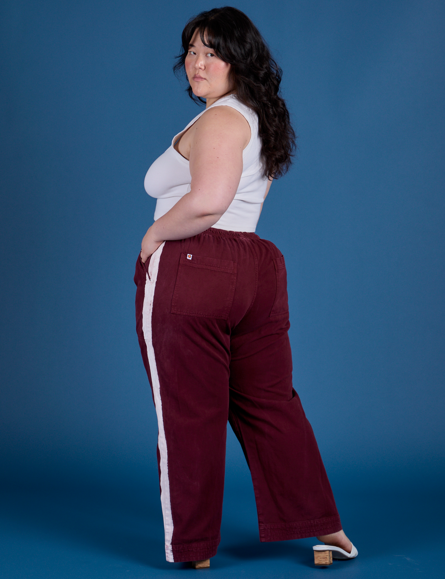 Painted Action Pants in Red Wine angled back view on Ashley