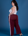 Painted Action Pants in Red Wine angled back view on Ashley