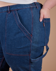 Side close up of Carpenter Jeans in Dark Wash on Ashley