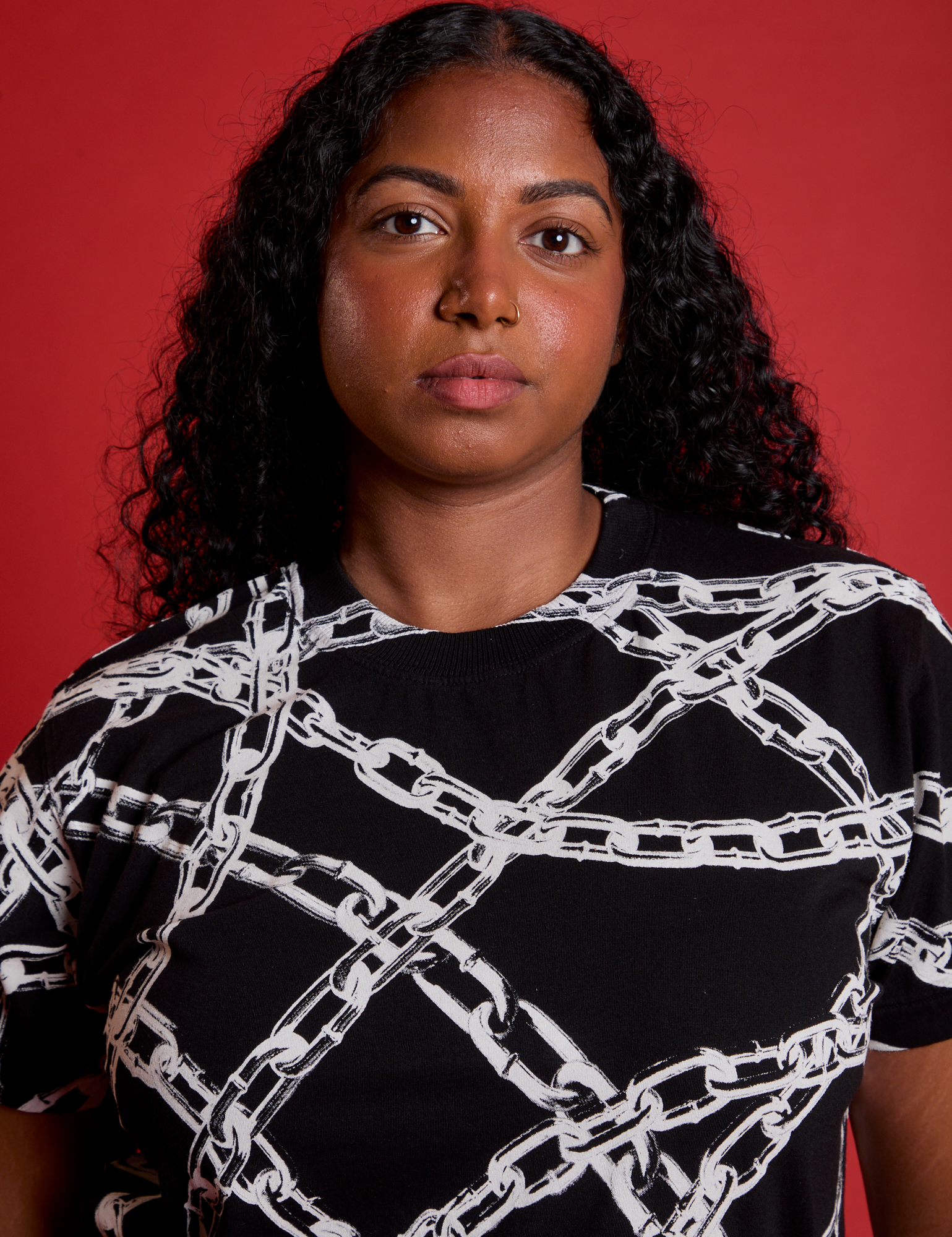 Front close up of Chain Link Vintage Tee in Basic Black on Meghna