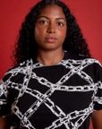 Front close up of Chain Link Vintage Tee in Basic Black on Meghna