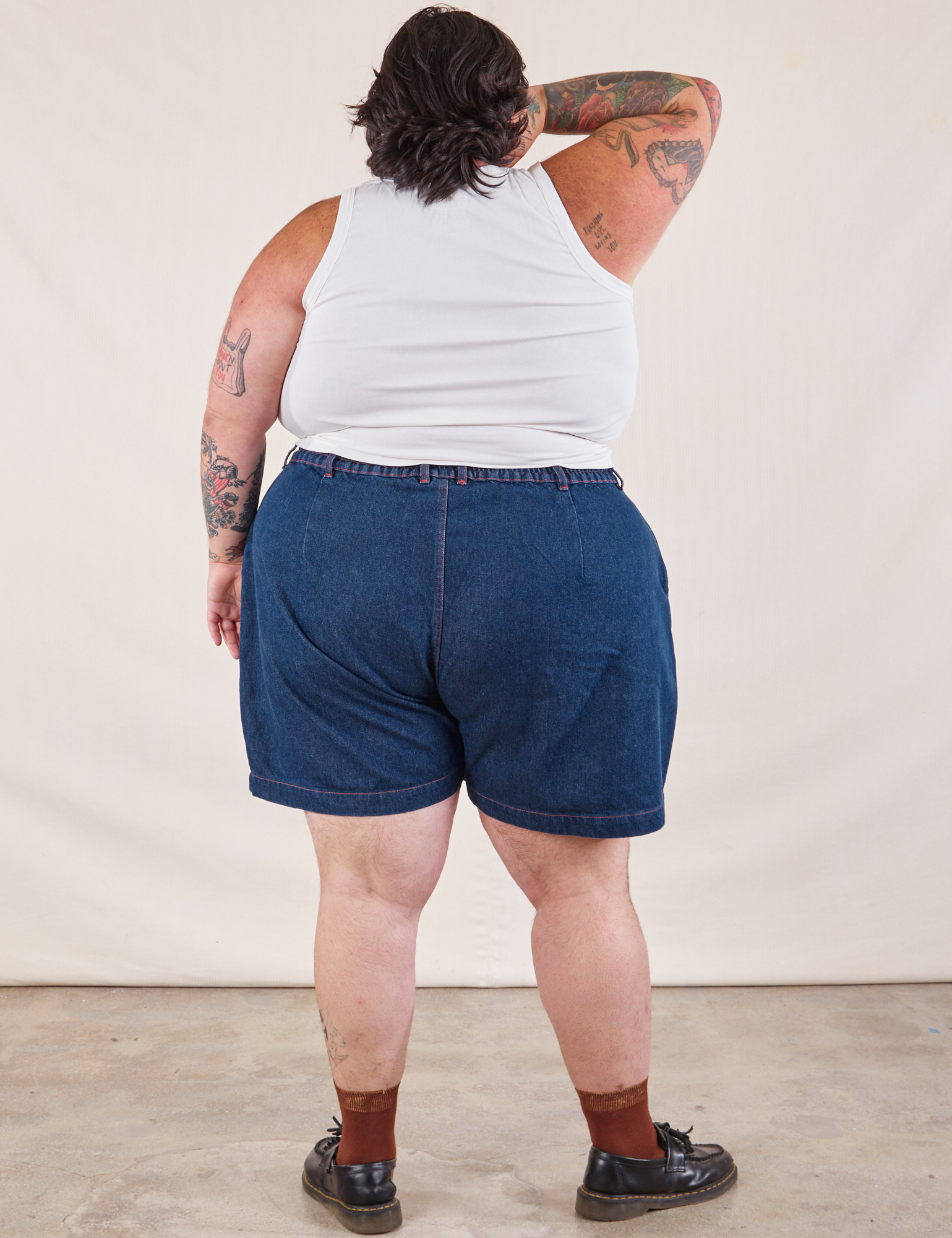 Back view of Denim Trouser Shorts in Dark Wash and Cropped Tank in Sam