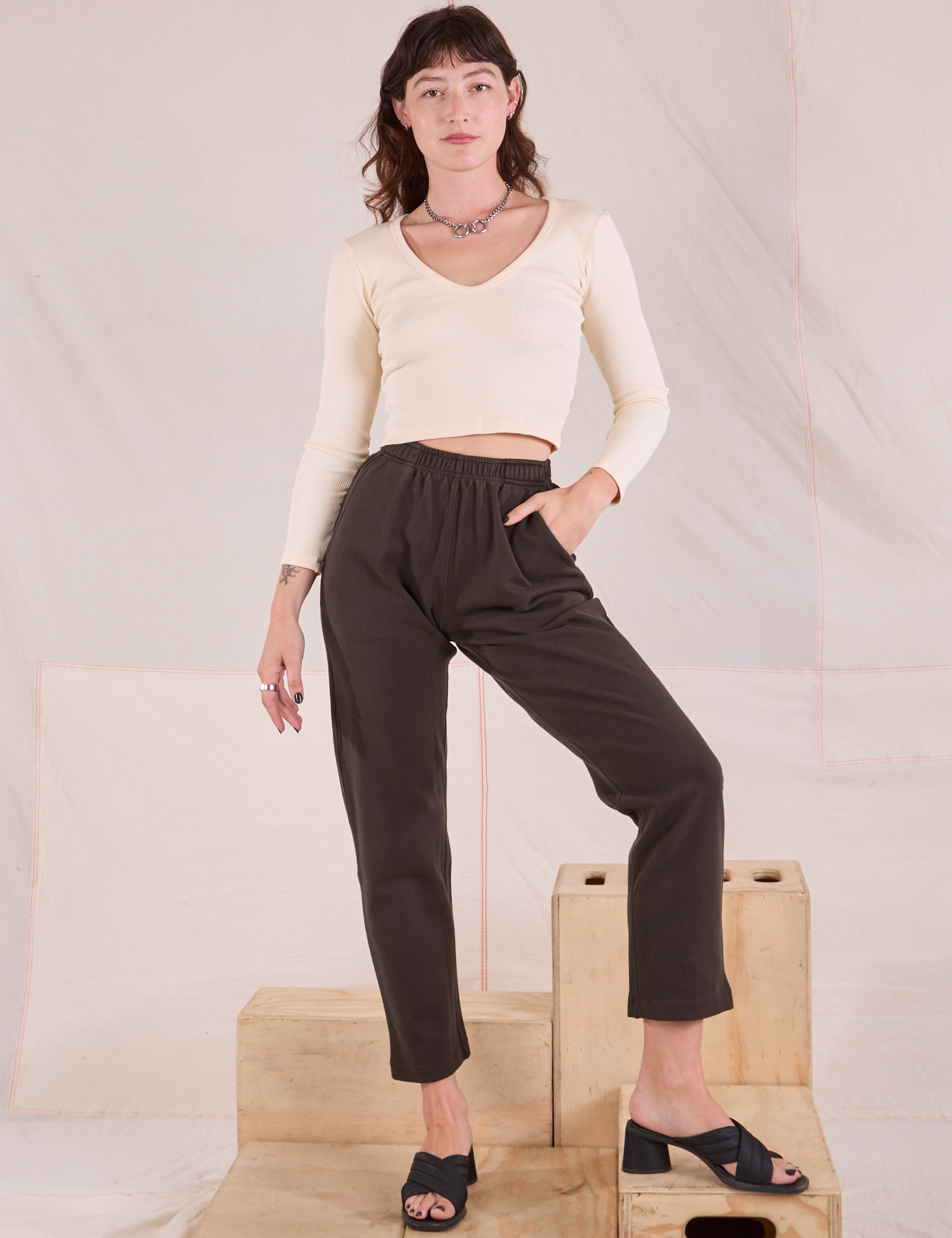 Alex is 5&#39;8&quot; and wearing P Easy Pants in Espresso Brown paired with vintage tee off-white Long Sleeve V-Neck Tee