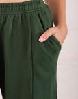 Easy Western Pants in Swamp Green close up of Tiara's hand in the pocket