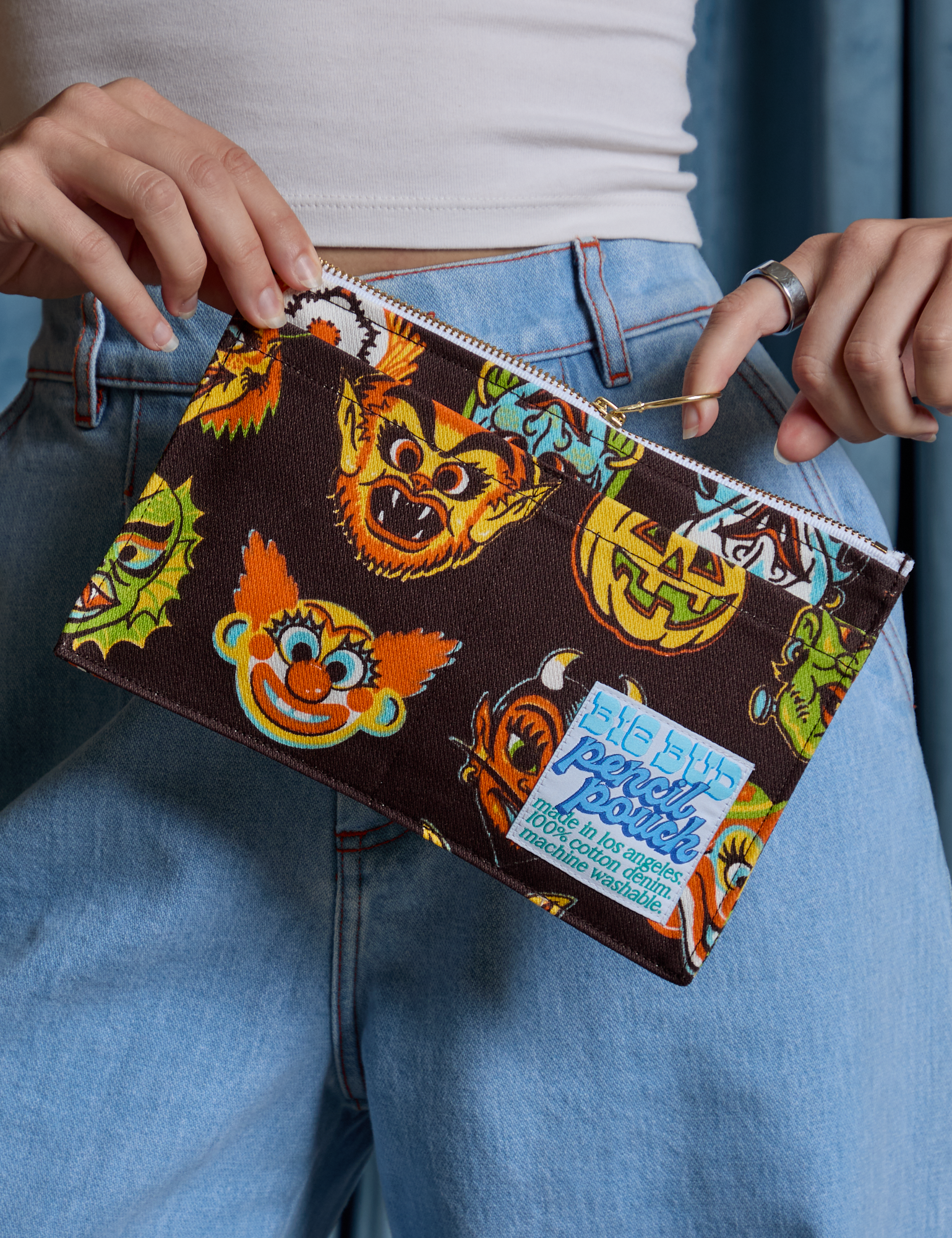 Halloween Masks Pencil Pouch held by Alex