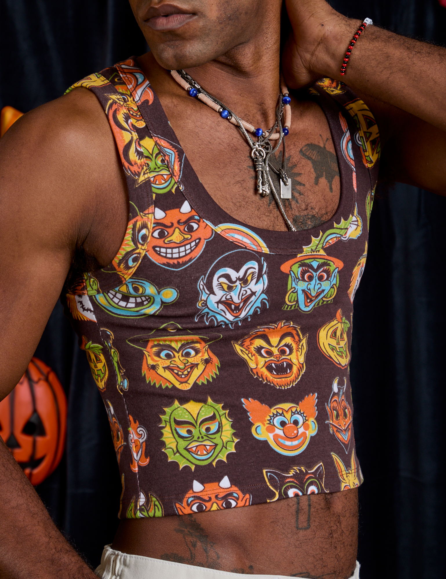 Cropped Tank Top in Halloween Masks angled front view close up on Jerrod