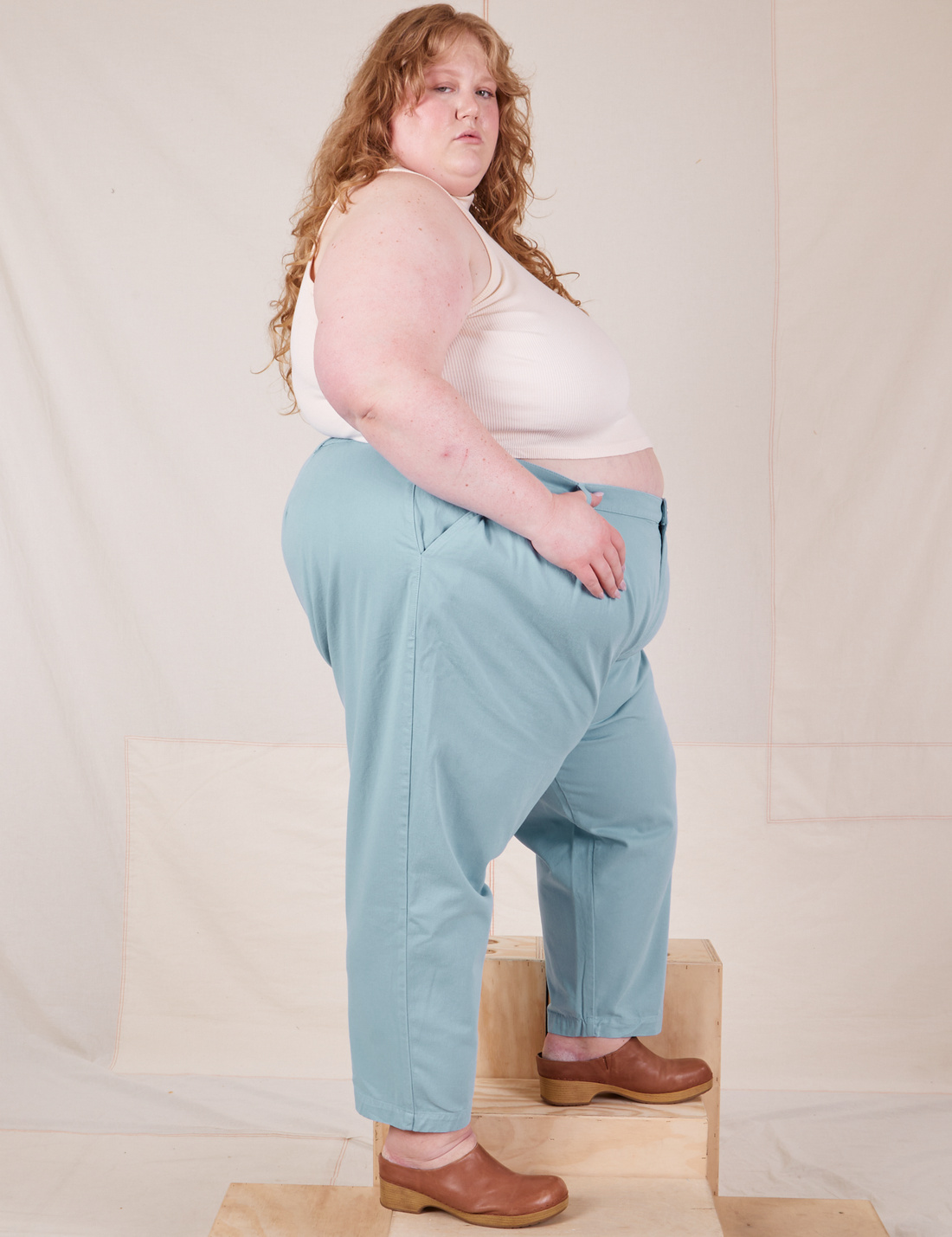 Side view of Heavyweight Trousers in Baby Blue worn by Catie