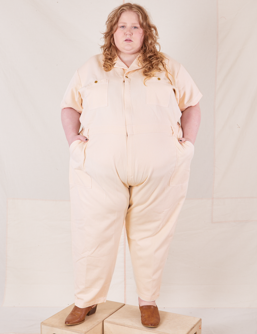 Catie is 5'11" and wearing size 5XL Heritage Short Sleeve Jumpsuit in Natural