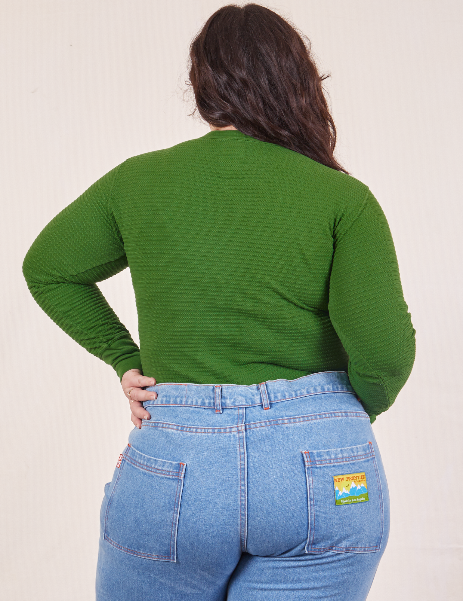 Back view of Honeycomb Thermal in Lawn Green worn by Ashley