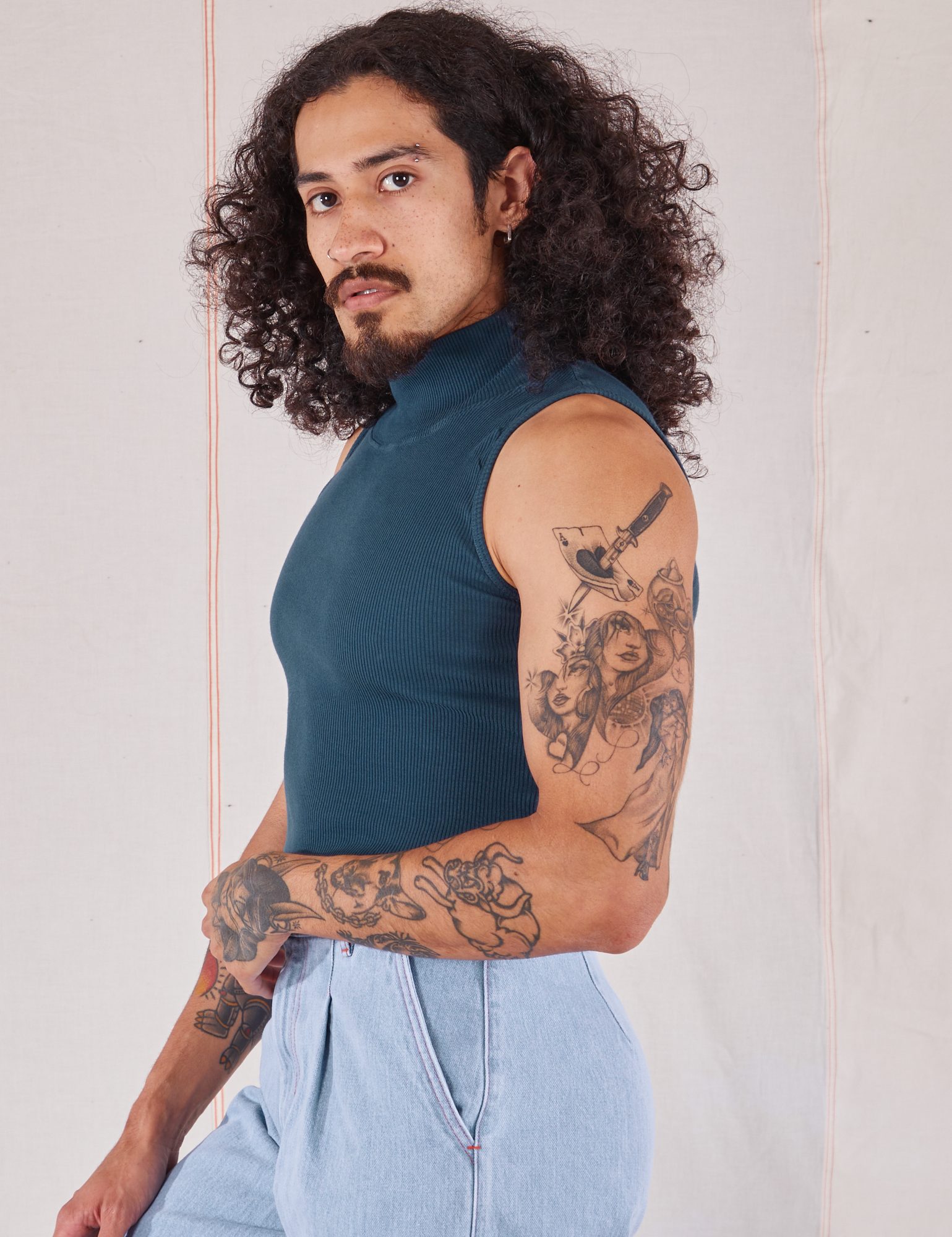 Sleeveless Essential Turtleneck in Lagoon side view on Jesse